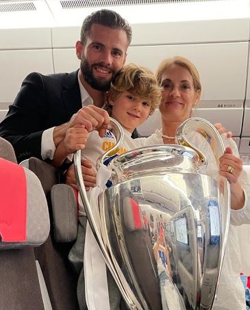 Maite Iglesias with her son Nacho and grandson after her son won a trophy